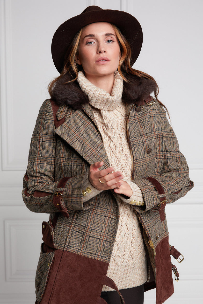 womens fitted field jacket in taupe brown orange and blue tweed trimmed with contrast chocolate suede on shoulder across back and on the hip with faux fur trim around the neck finished with horn button fastenings an buckles on the collar cuffs and hip