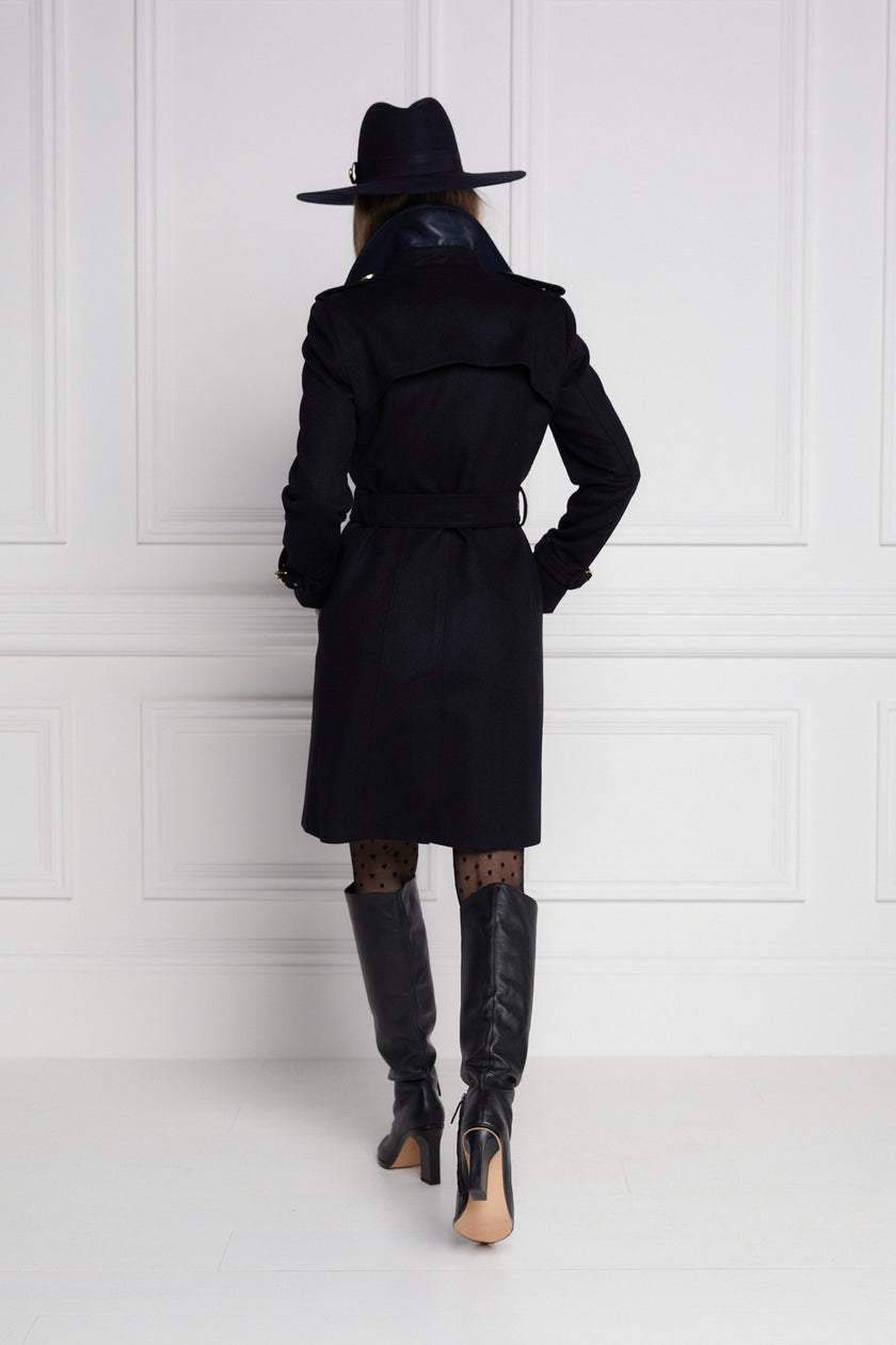 Back of womens navy detailed with gold hardware knee length wool trench coat