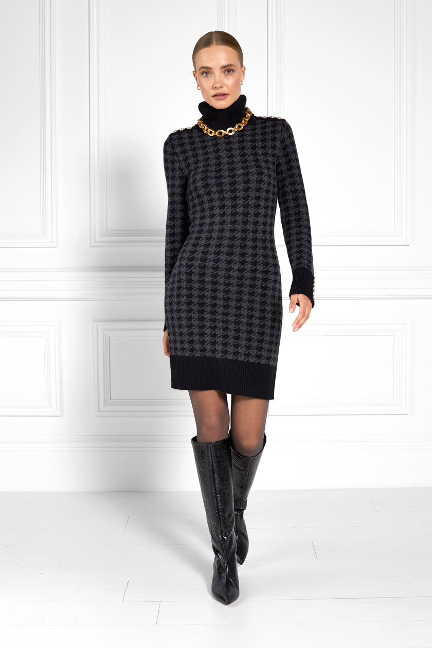 womens black and dark grey houndstooth roll neck jumper dress with contrast black cuffs and ribbed hem with gold button detail on the cuffs and shoulders