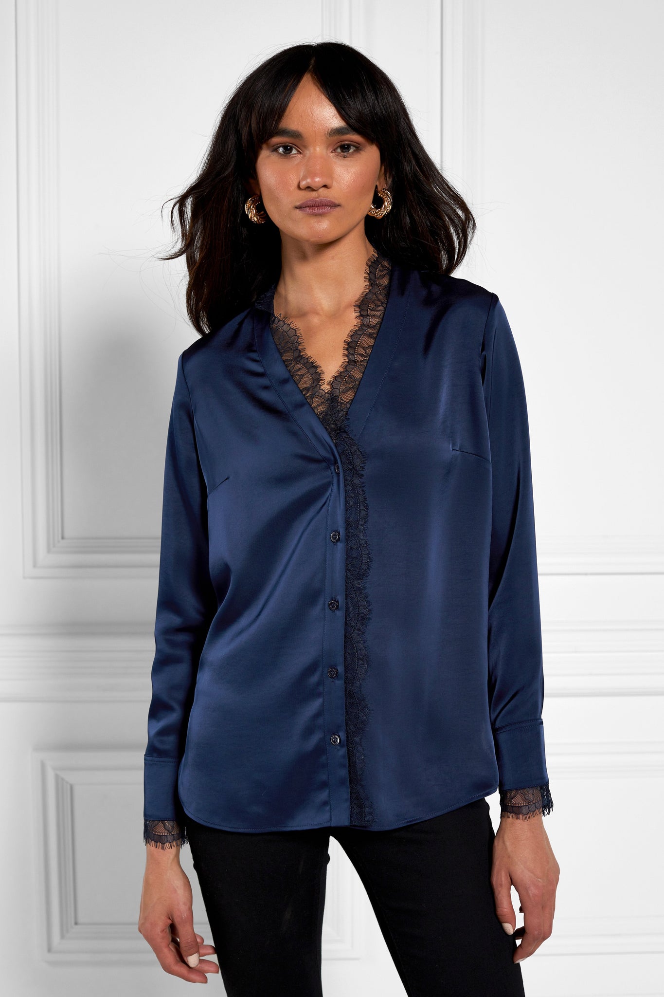 womens blue long sleeve silk v neck blouse with black lace hem details