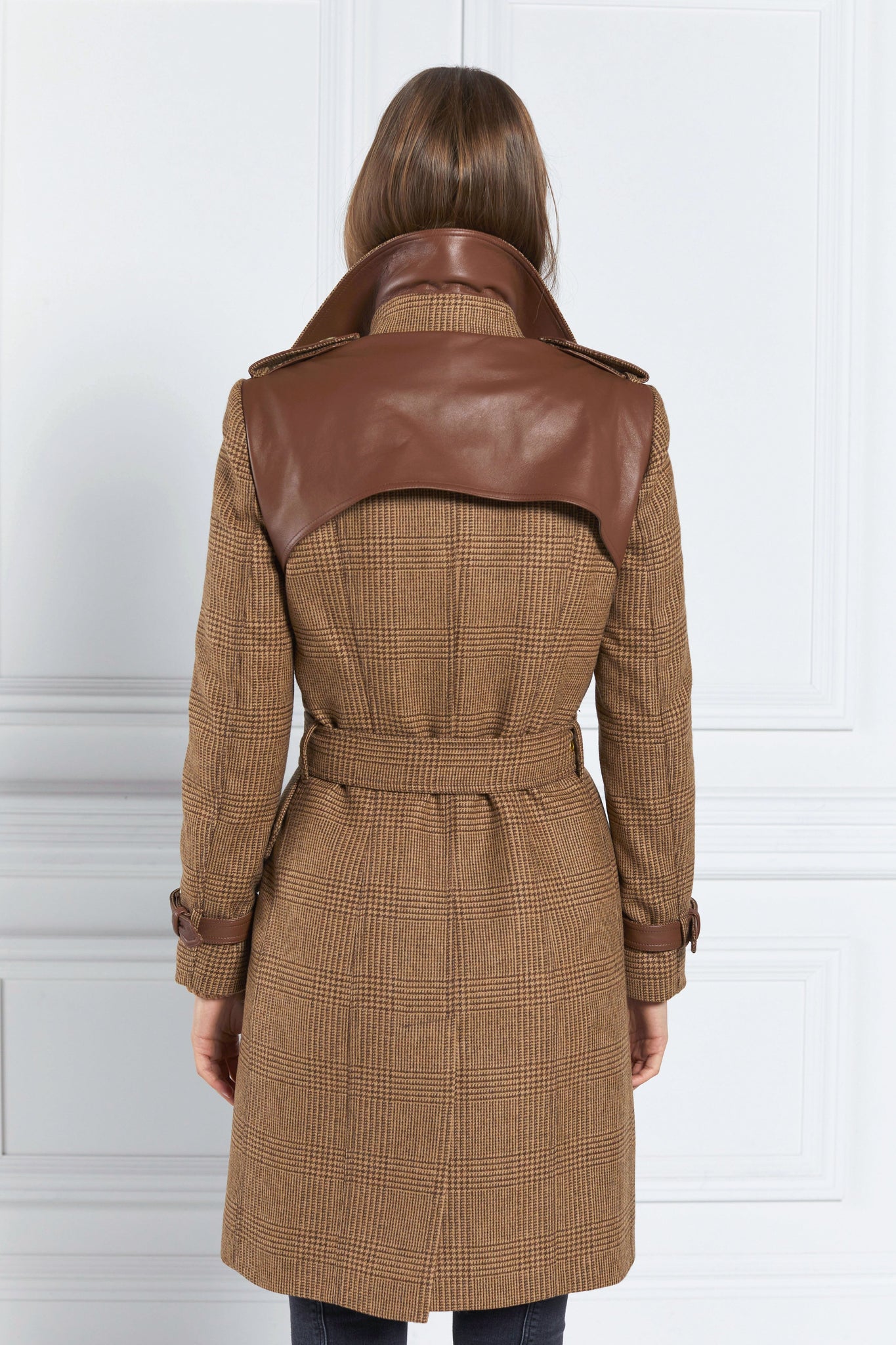 back of womens tawny light tan detailed with gold hardware knee length wool trench coat