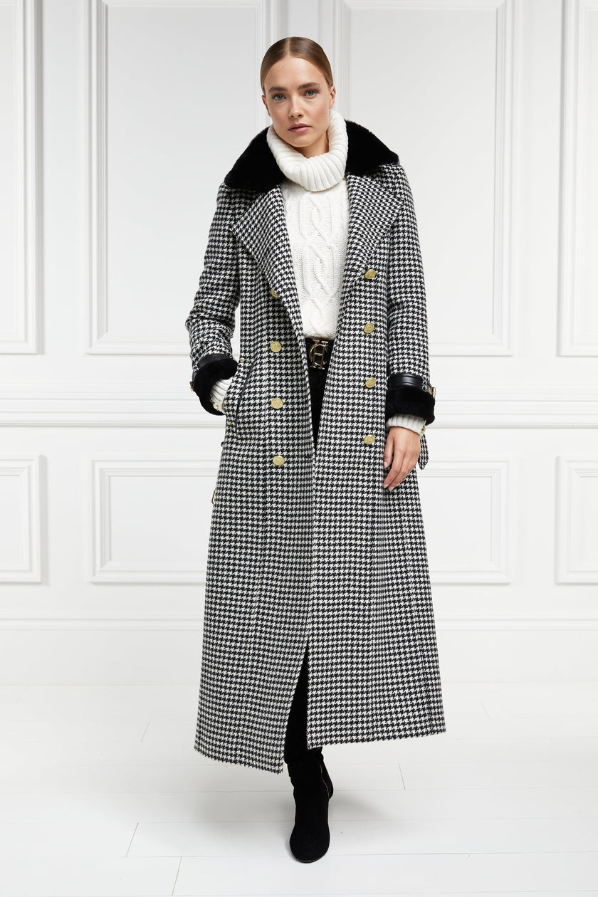 womens black and white houndstooth double breasted full length trench coat with black faux fur collar and cuffs