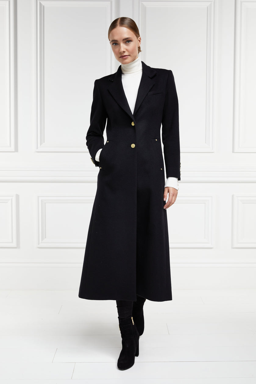 front of black single breasted full length wool coat