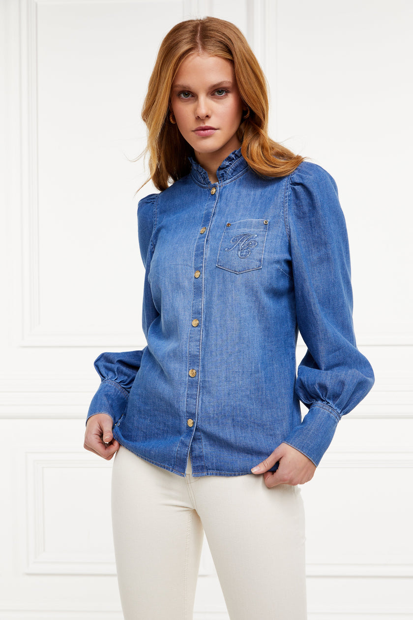 womens indigo long sleeve denim shirt with ruffled collar balloon sleeves and gold buttons