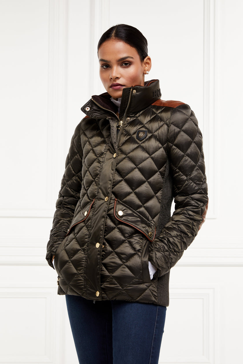 womens diamond quilted khaki jacket with contrast tan leather elbow and shoulder pads large front pockets and shirred side panels