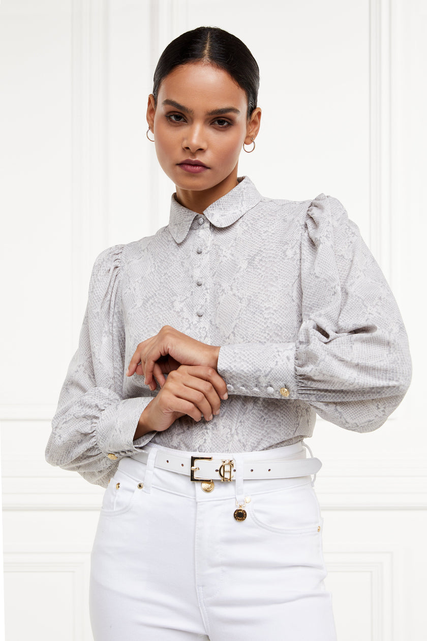 A classic fitted shirt with long sleeves and subtle puffy shoulders with grey snake print design with extra long cuffs and rounded collar detailed with fabric buttons 