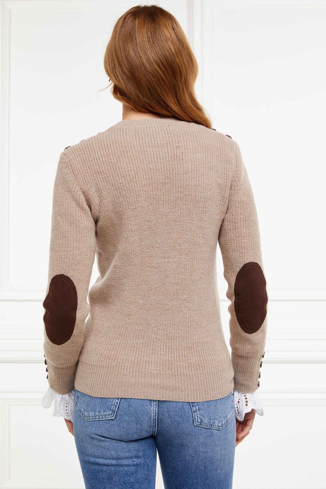 back of classic crew neck slim fit merino wool jumper in taupe with brown faux suede gunpatch on shoulder and quilted elbow patches in the same brown suede material