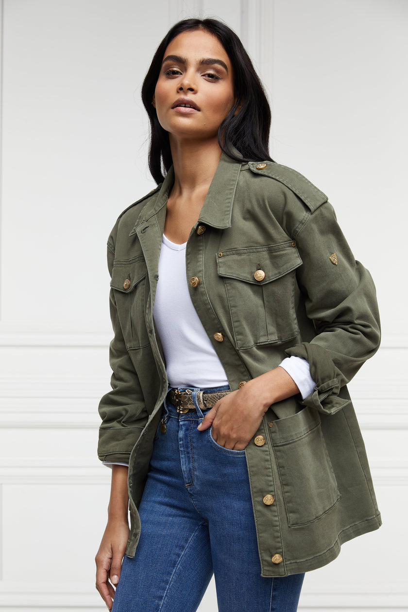 Relaxed fit collared artillery style jacket in khaki with four pockets two chest ones being box pleated  and two hip being patch pockets with gold jean button fastenings adjustable long sleeves and epaulette shoulder detail