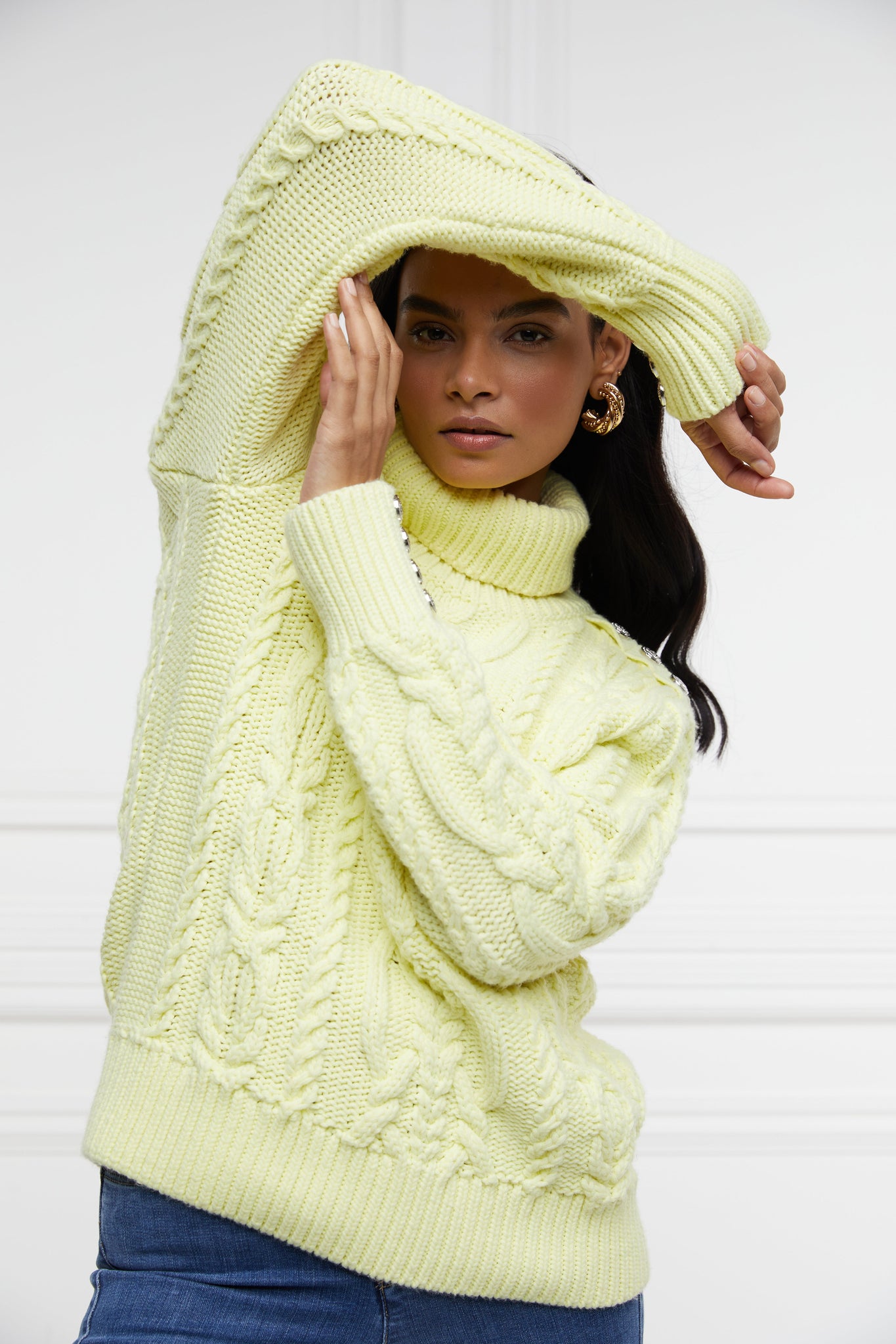 chunky cable knit jumper in lemon yellow with ribbed roll neck hem and cuffs