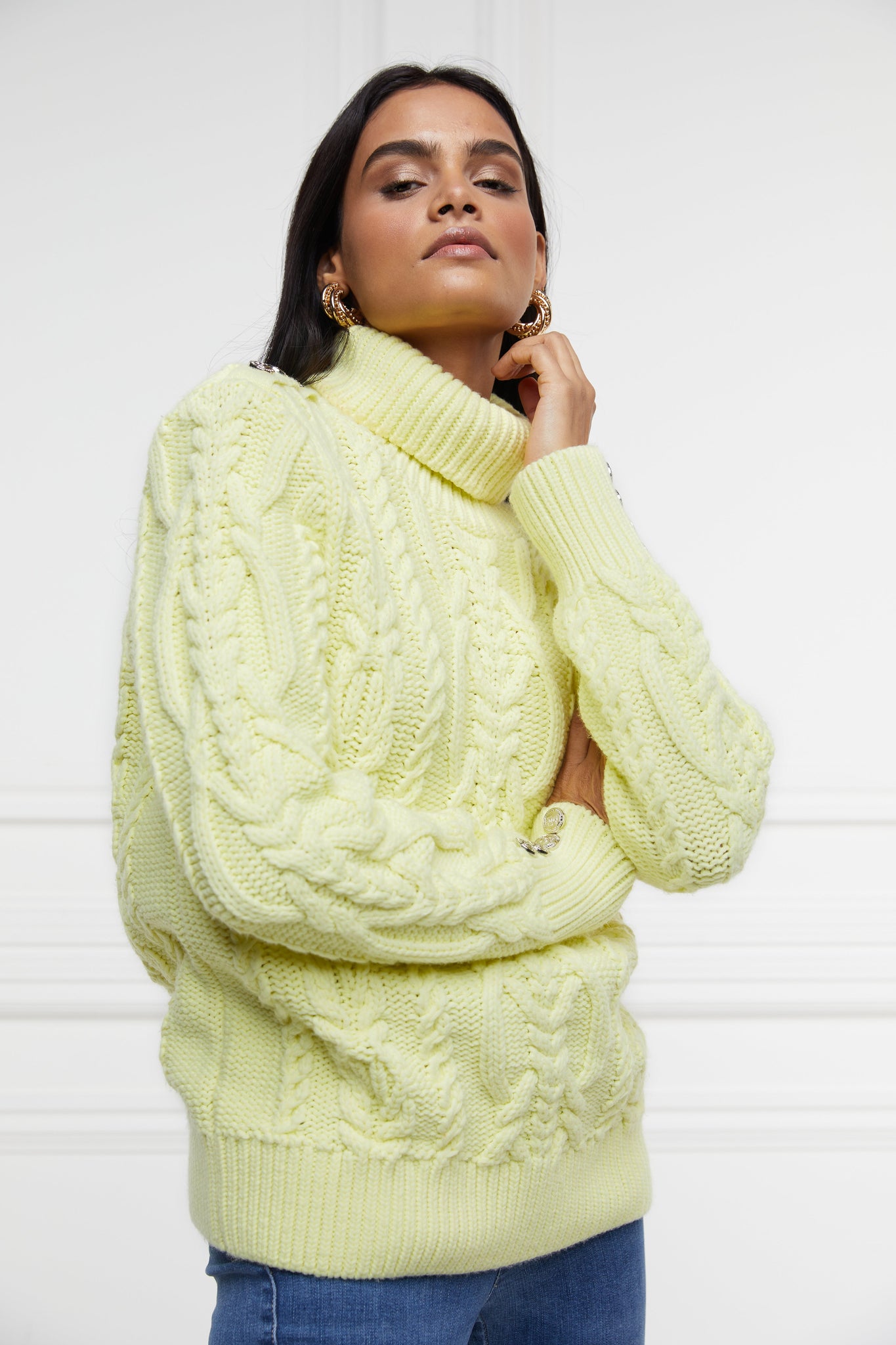 chunky cable knit jumper in lemon yellow with ribbed roll neck hem and cuffs