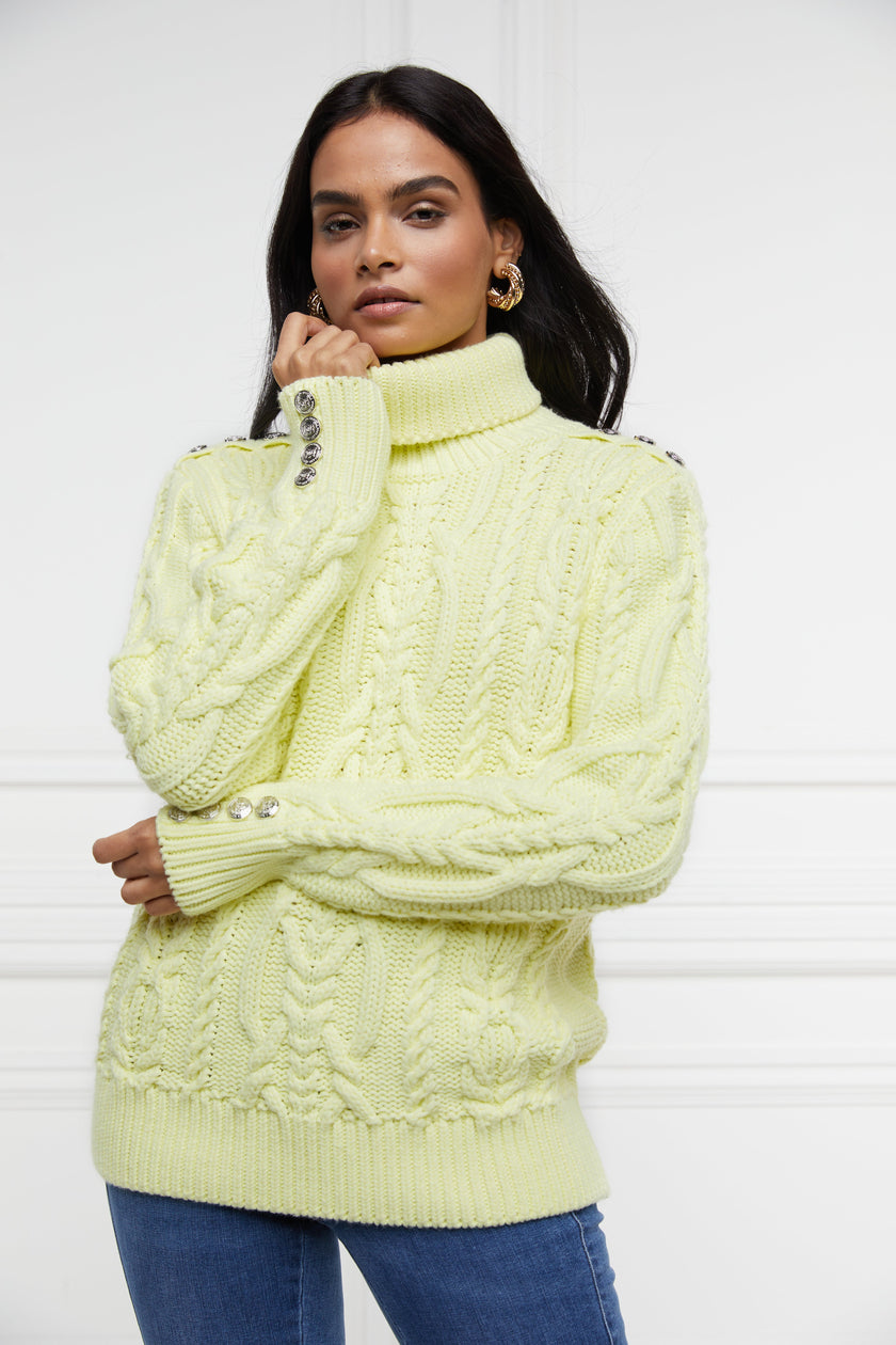 chunky cable knit jumper in lemon yellow with ribbed roll neck hem and cuffs