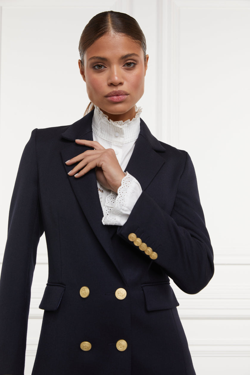 double breasted wool blazer in navy twill with two hip pockets and gold button detials down front and on cuffs and handmade in the uk