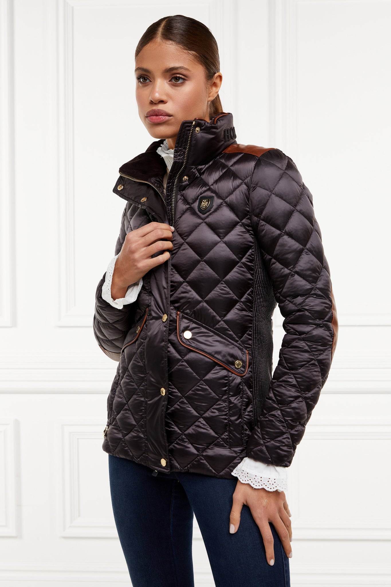 womens diamond quilted chocolate jacket with contrast tan leather elbow and shoulder pads large front pockets and shirred side panels