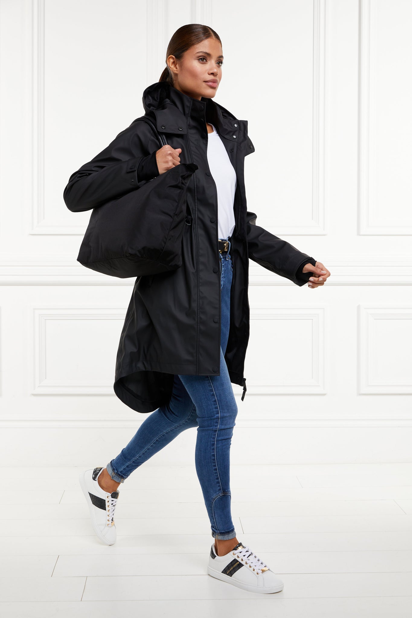 womens black hooded rain coat with black hardware 