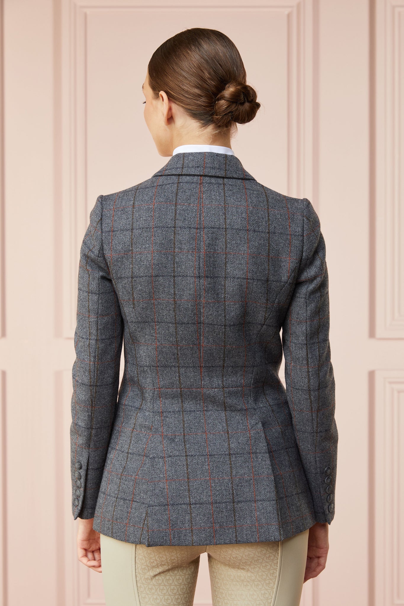 back of womens grey tweed riding jacket 