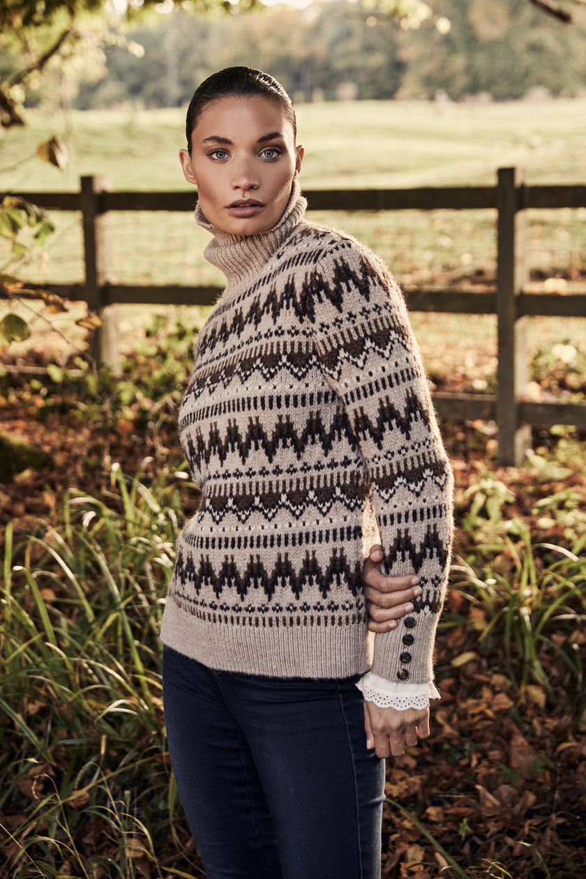 high roll neck knit jumper in taupe with a brown fairisle pattern and ribbed cuffs hem and neckline