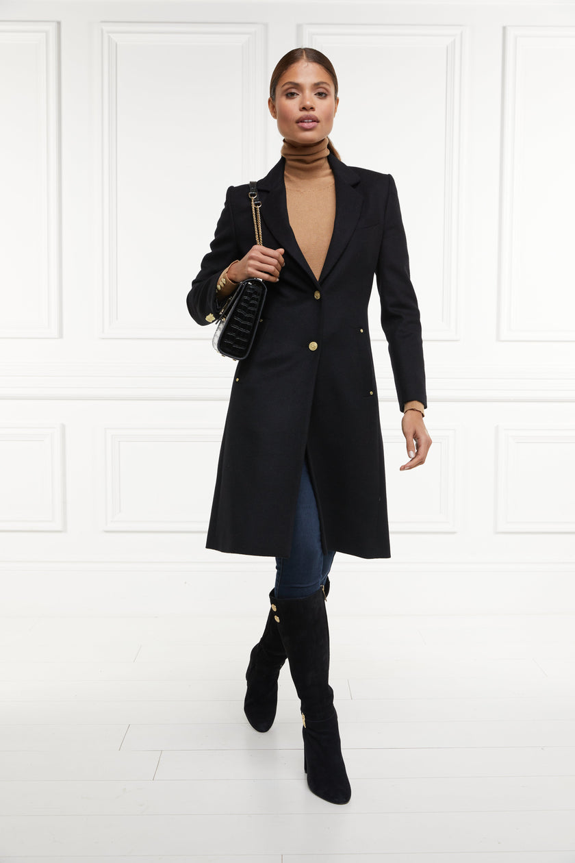 womens black wool knee length single breasted coat detailed with gold hardware