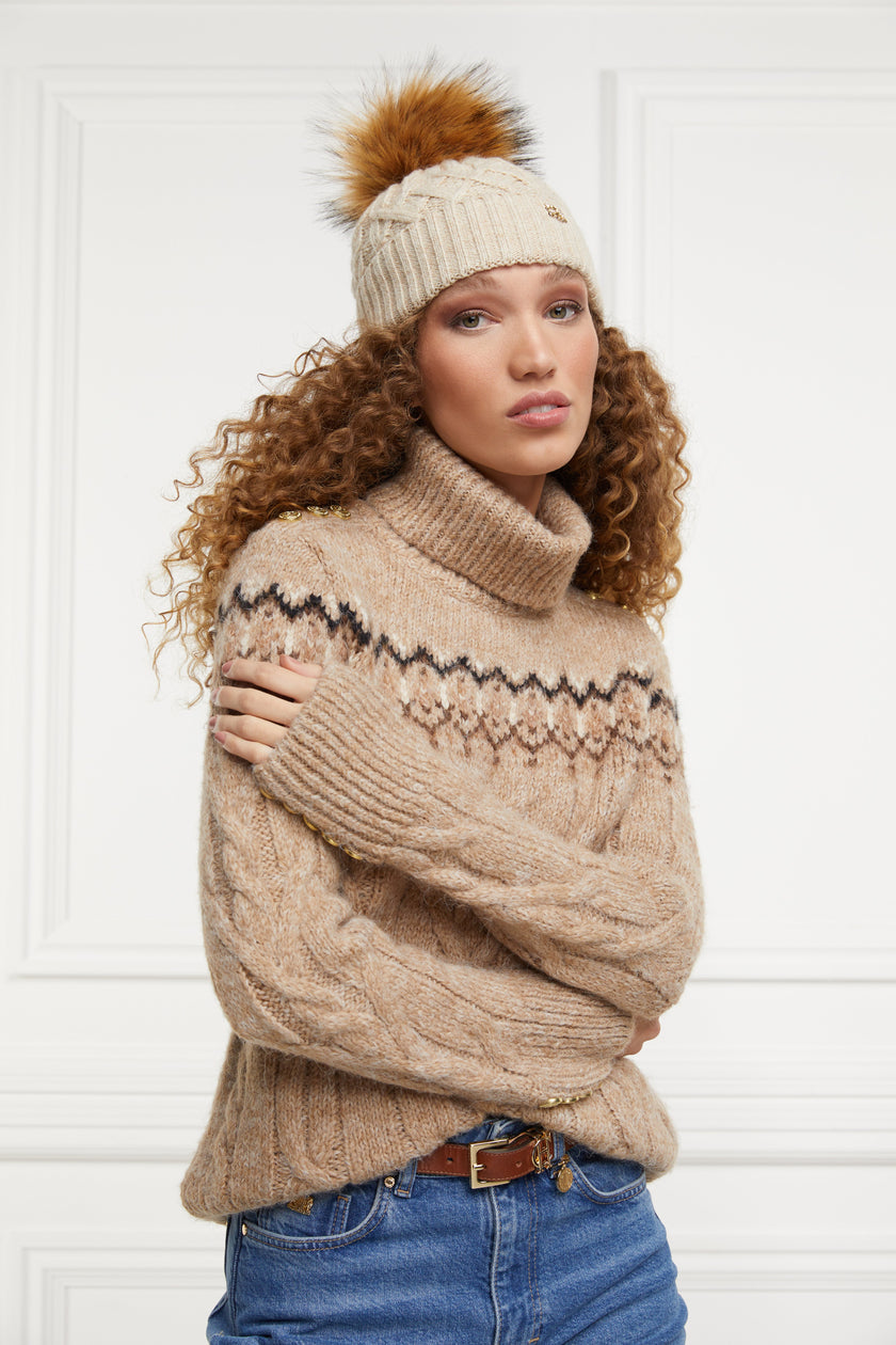 high roll neck cable knit jumper in camel with a black cream and dark camel fairisle knit detail across the chest around the upper arm and back