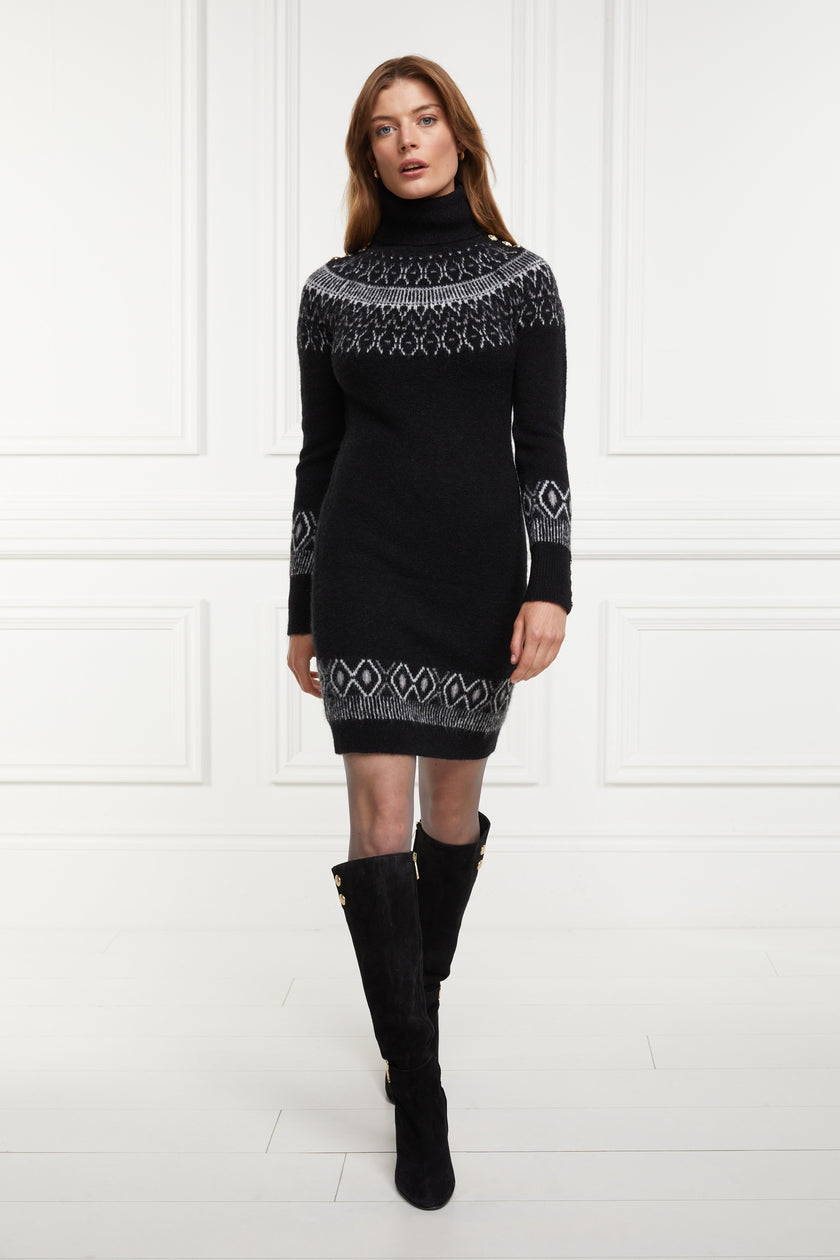 womens black roll neck jumper dress with fairisle knit in white and grey around the shoulders hemline and cuffs and a ribbed hem with gold buttons on shoulders and cuffs