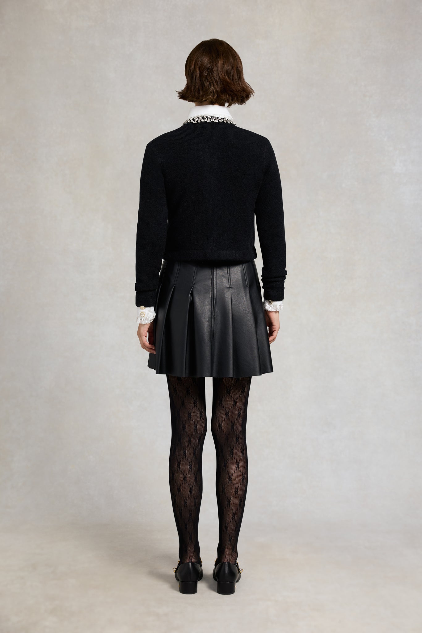 Faux Leather Pleated Mini Skirt (Black)