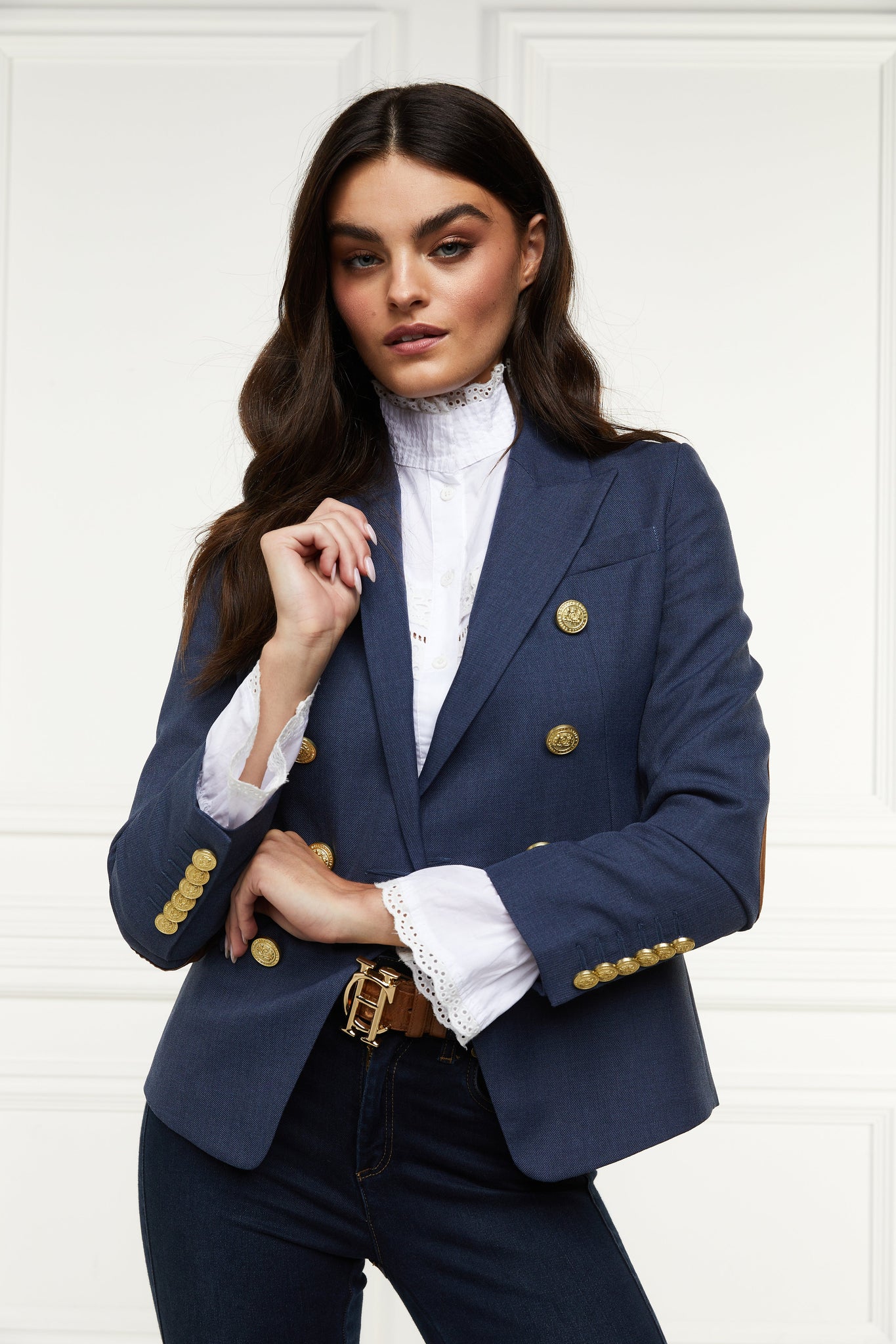 British made double breasted blazer that fastens with a single button hole to create a more form fitting silhouette with two pockets and gold button detailing this blazer in denim