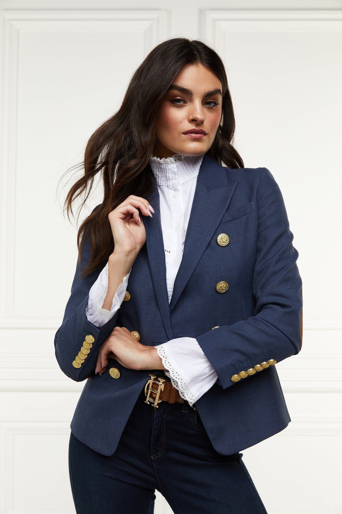 British made double breasted blazer that fastens with a single button hole to create a more form fitting silhouette with two pockets and gold button detailing this blazer in denim