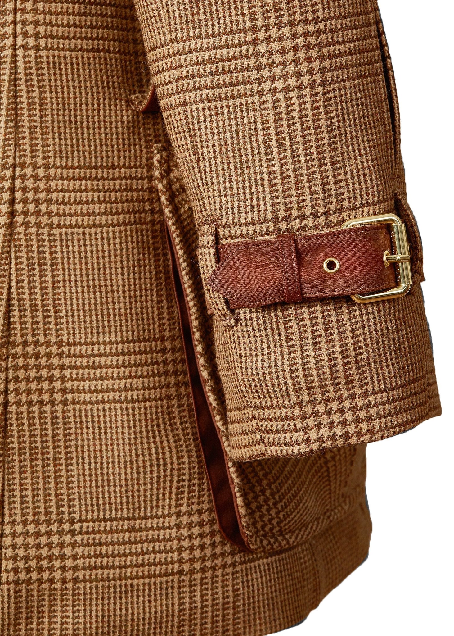 Arm detail of tan brown tartan tweed field coat