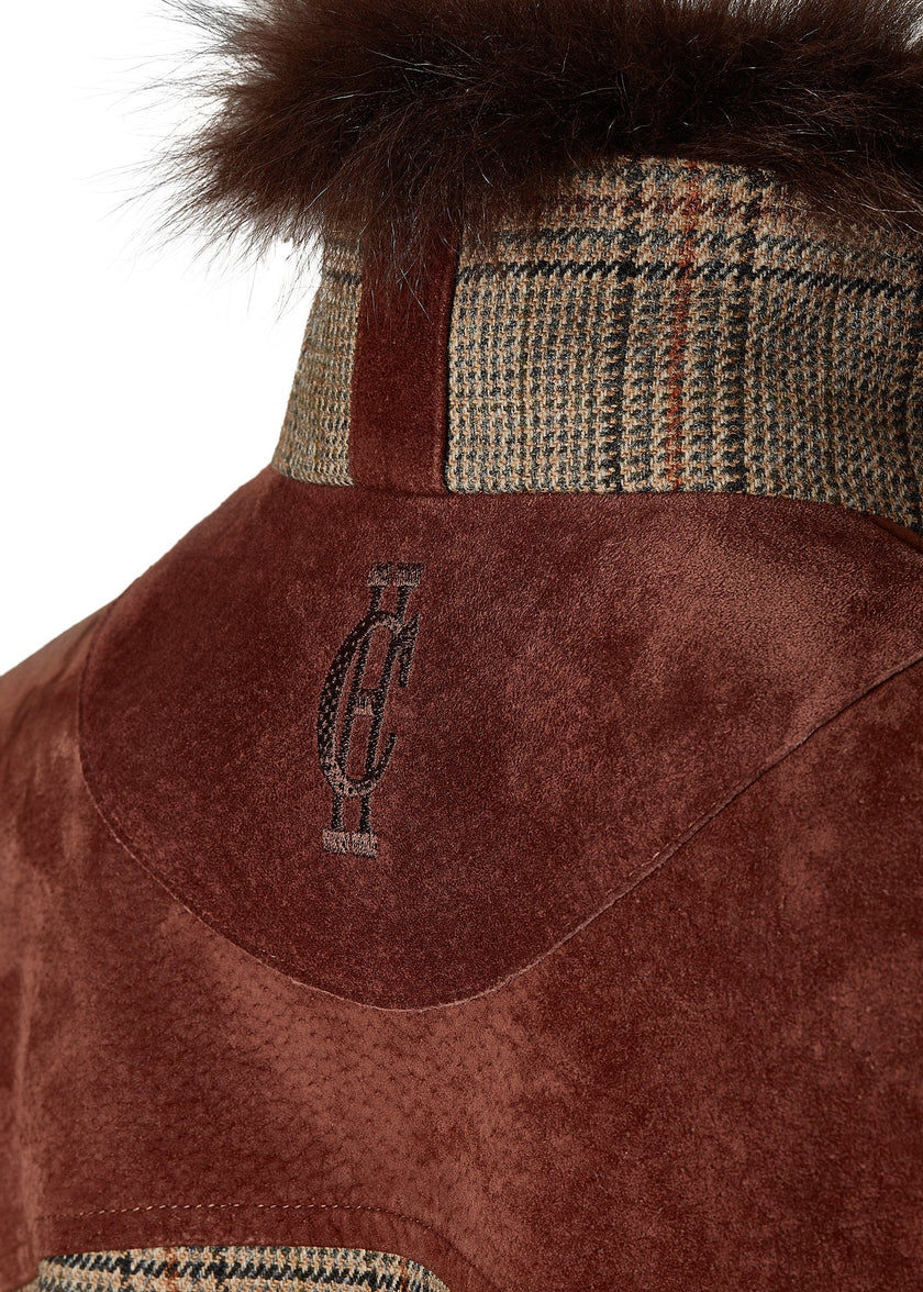 suede detail with hc embroidery on back of  womens fitted field jacket in taupe brown orange and blue tweed trimmed with contrast chocolate suede on shoulder across back and on the hip with faux fur trim around the neck finished with horn button fastenings an buckles on the collar cuffs and hip