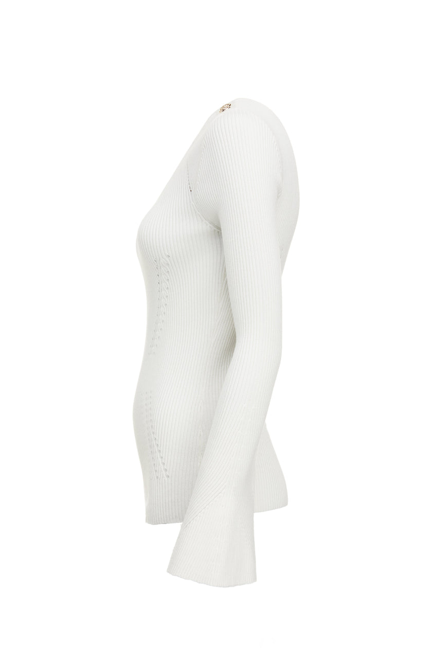 side of a form fitting lightweight ribbed knit cream jumper with a boat neckline and bell sleeves