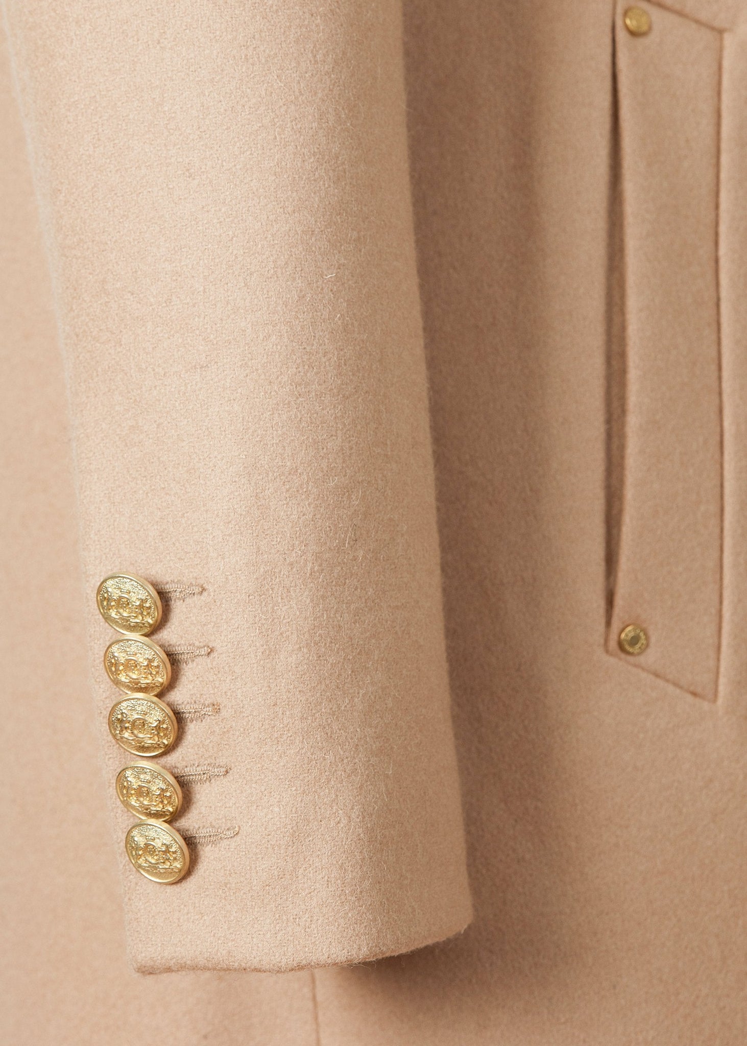 Sleeve detail of Womens camel wool double breasted mid-length tweed coat 