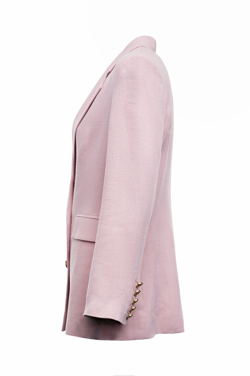 side of double breasted linen blazer in pale pink with two hip pockets and gold button detials down front and on cuffs and handmade in the uk 