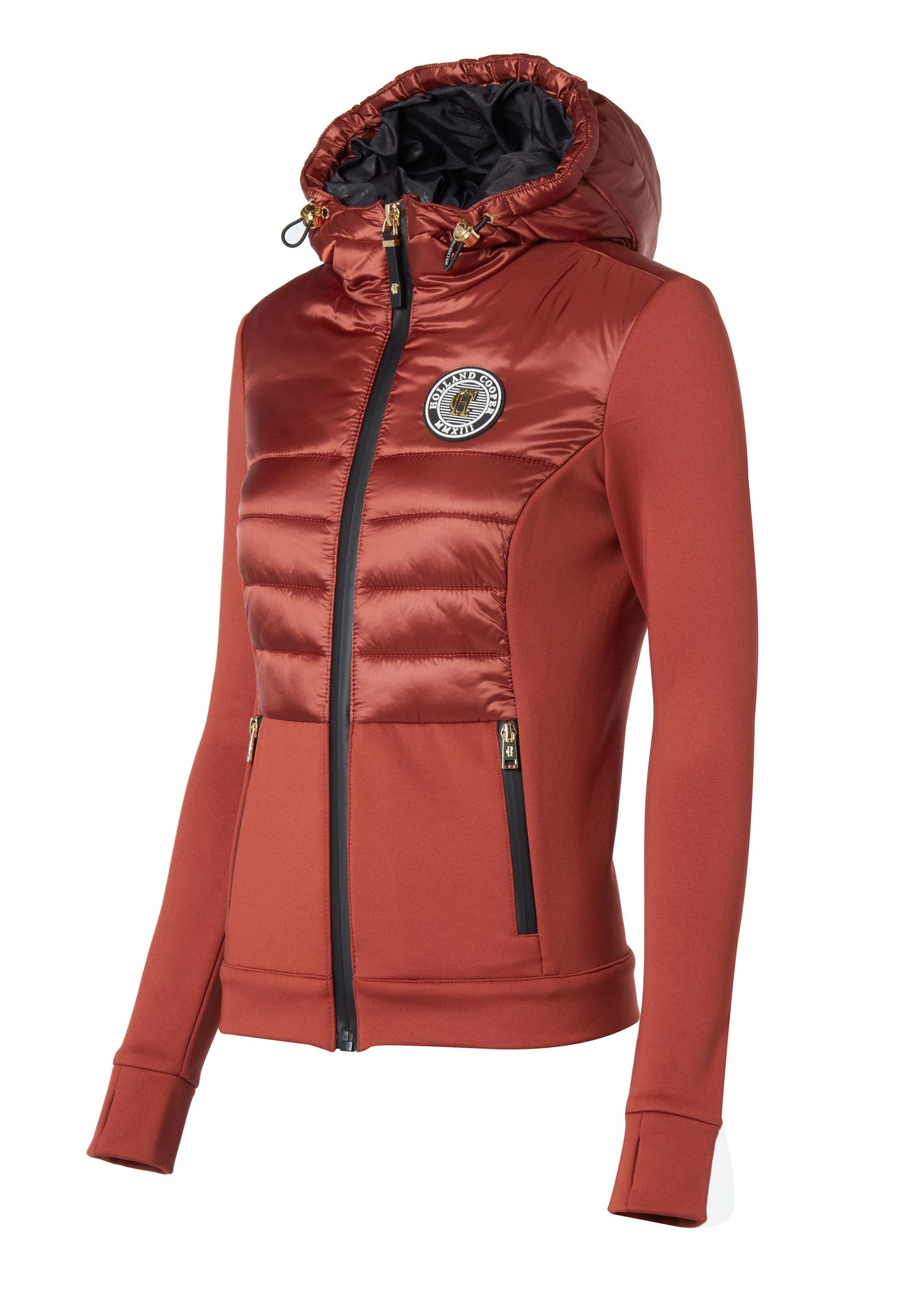 side of hooded hybrid jacket in rust with jersey panels on the waist and sleeves and Sorona eco down fill on hood front and back body panels finished with rubbed zip fastening in black and two side pockets with the same zip fastenings