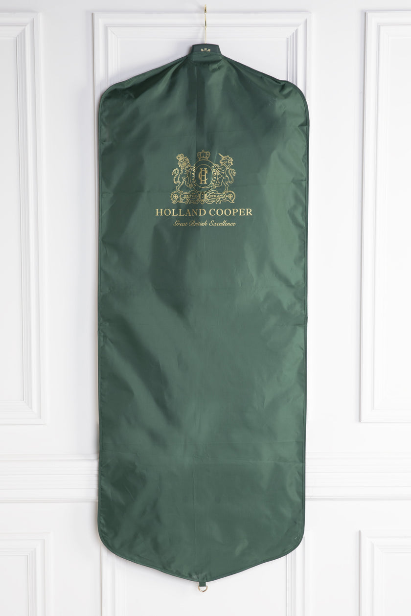 green garment bag that comes alongside all pieces of tailoring 