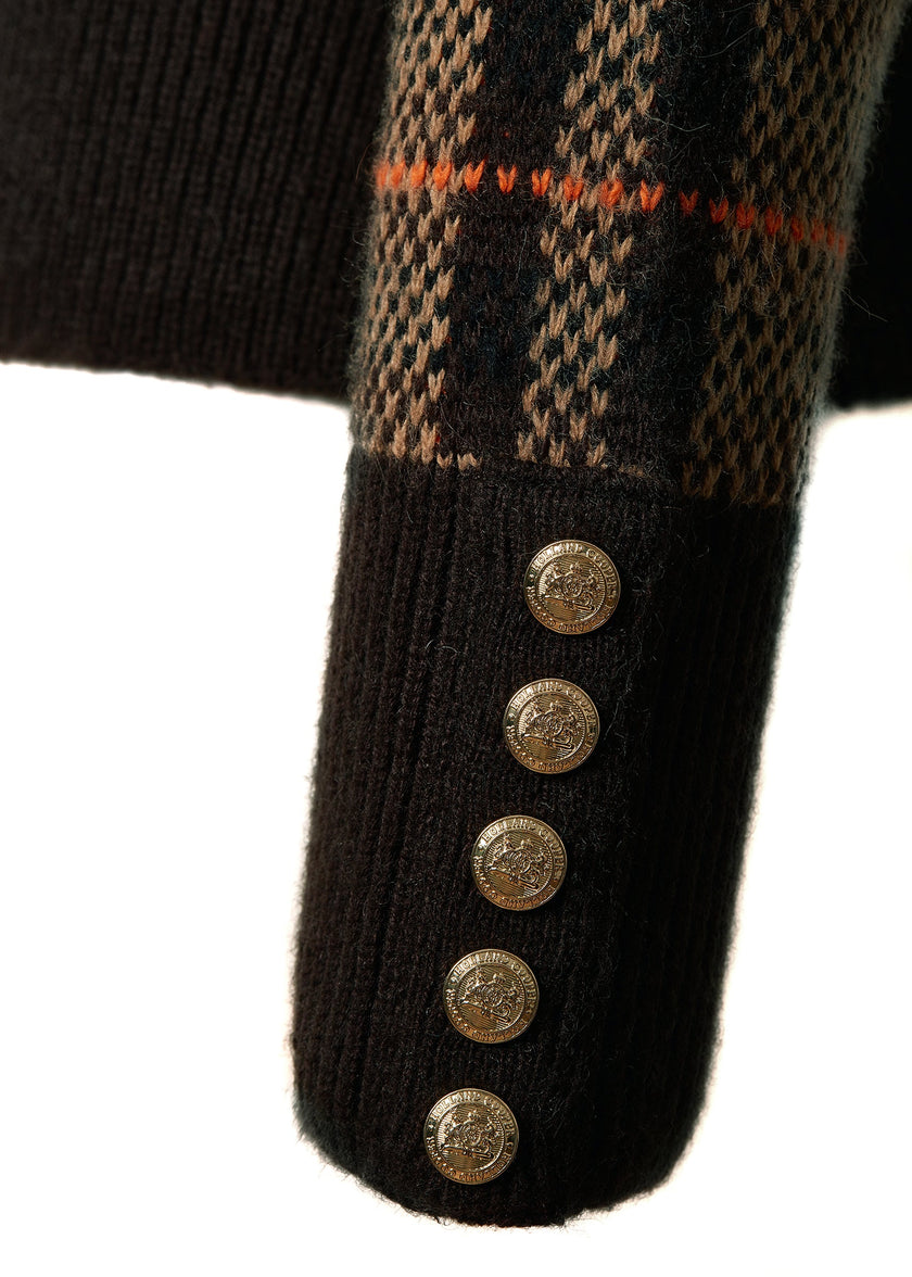 gold button details on  cuffs of a classic camel check jumper with contrast brown cuffs, roll neck and split ribbed hem with gold button detail on the cuffs and collar