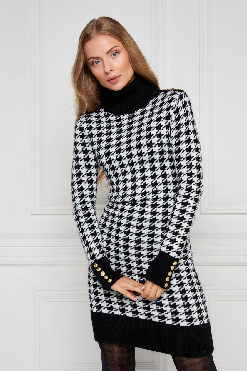 womens black and white houndstooth roll neck jumper dress with contrast black cuffs and ribbed hem with gold button detail on the cuffs and shoulders