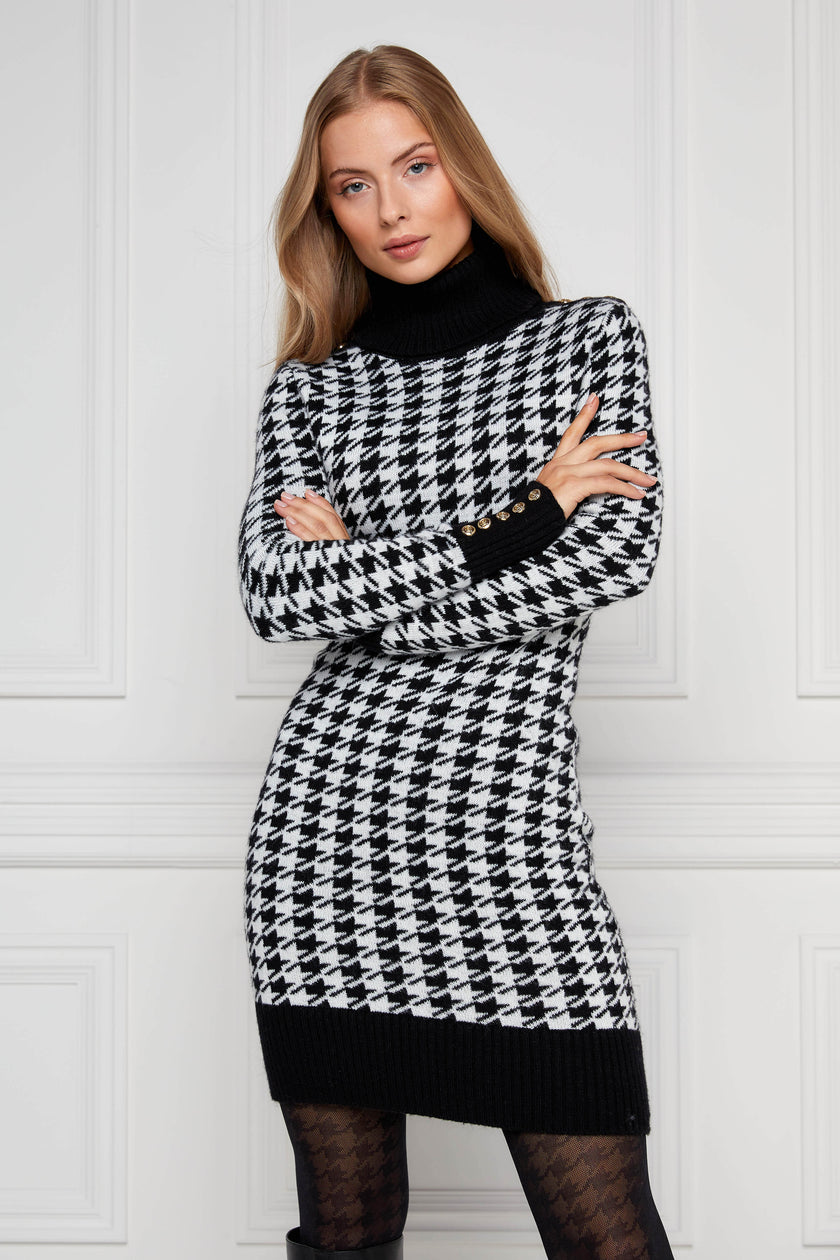 womens black and white houndstooth roll neck jumper dress with contrast black cuffs and ribbed hem with gold button detail on the cuffs and shoulders