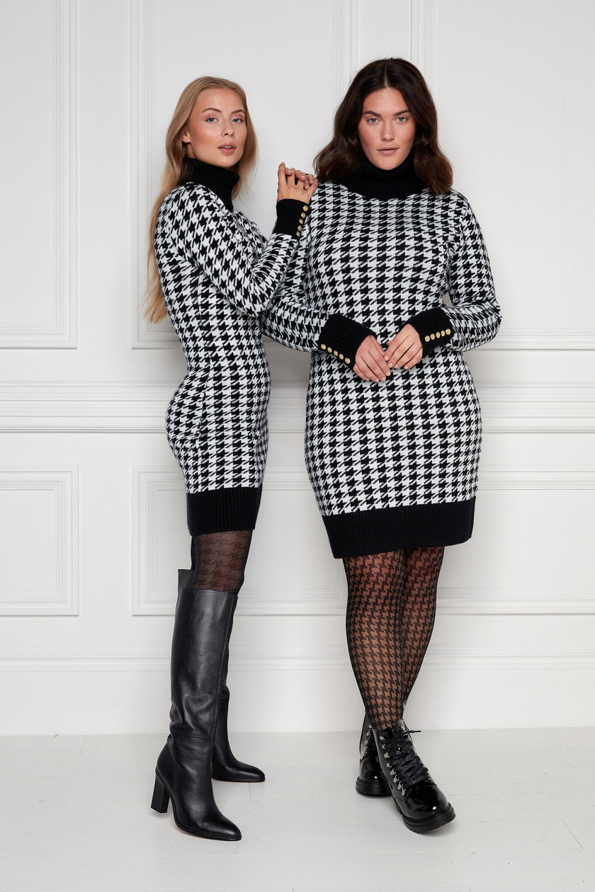 womens black and white houndstooth roll neck jumper dress with contrast black cuffs and ribbed hem with gold button detail on the cuffs and shoulders