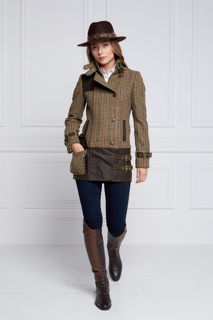 womens fitted field jacket in stone brown and green houndstooth tweed trimmed with contrast chocolate Millerain Wax fabric on shoulder across back and on the hip finished with horn button fastenings an buckles on the collar cuffs and hip