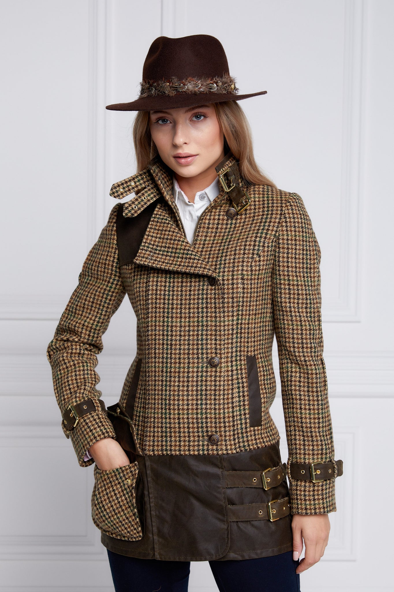 womens fitted field jacket in stone brown and green houndstooth tweed trimmed with contrast chocolate Millerain Wax fabric on shoulder across back and on the hip finished with horn button fastenings an buckles on the collar cuffs and hip