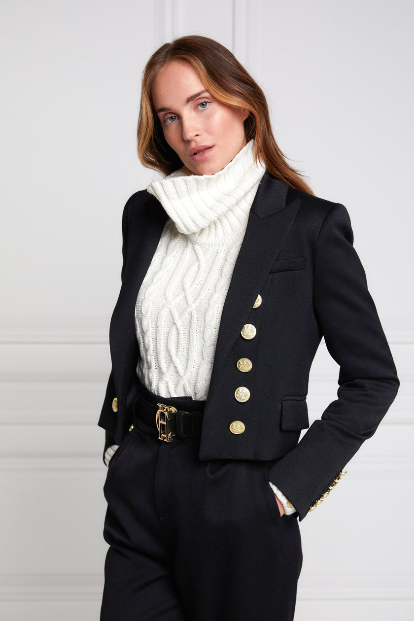 British made tailored cropped jacket in black with welt pockets and gold button detail down the front and on sleeves