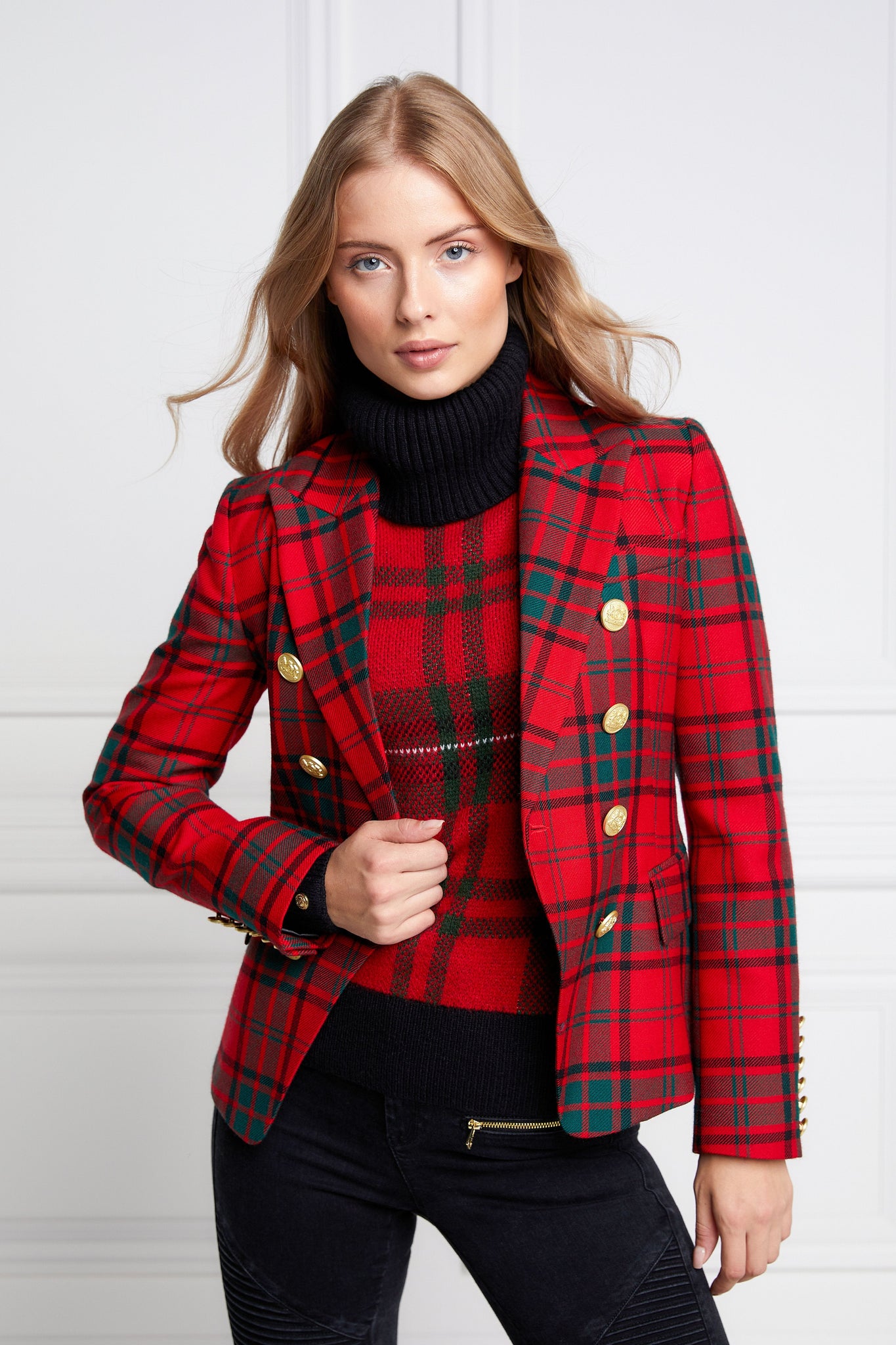 British made double breasted blazer that fastens with a single button hole to create a more form fitting silhouette with two pockets and gold button detailing this blazer is made from red and green tartan