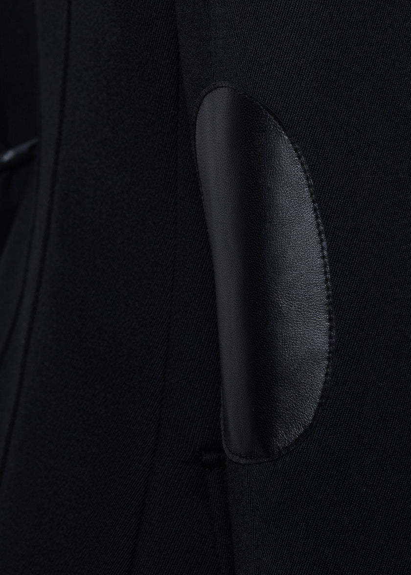 leather elbow patch on relaxed fit single breasted blazer breasted blazer in black with patch pockets and tonal black leather elbow patches and collar