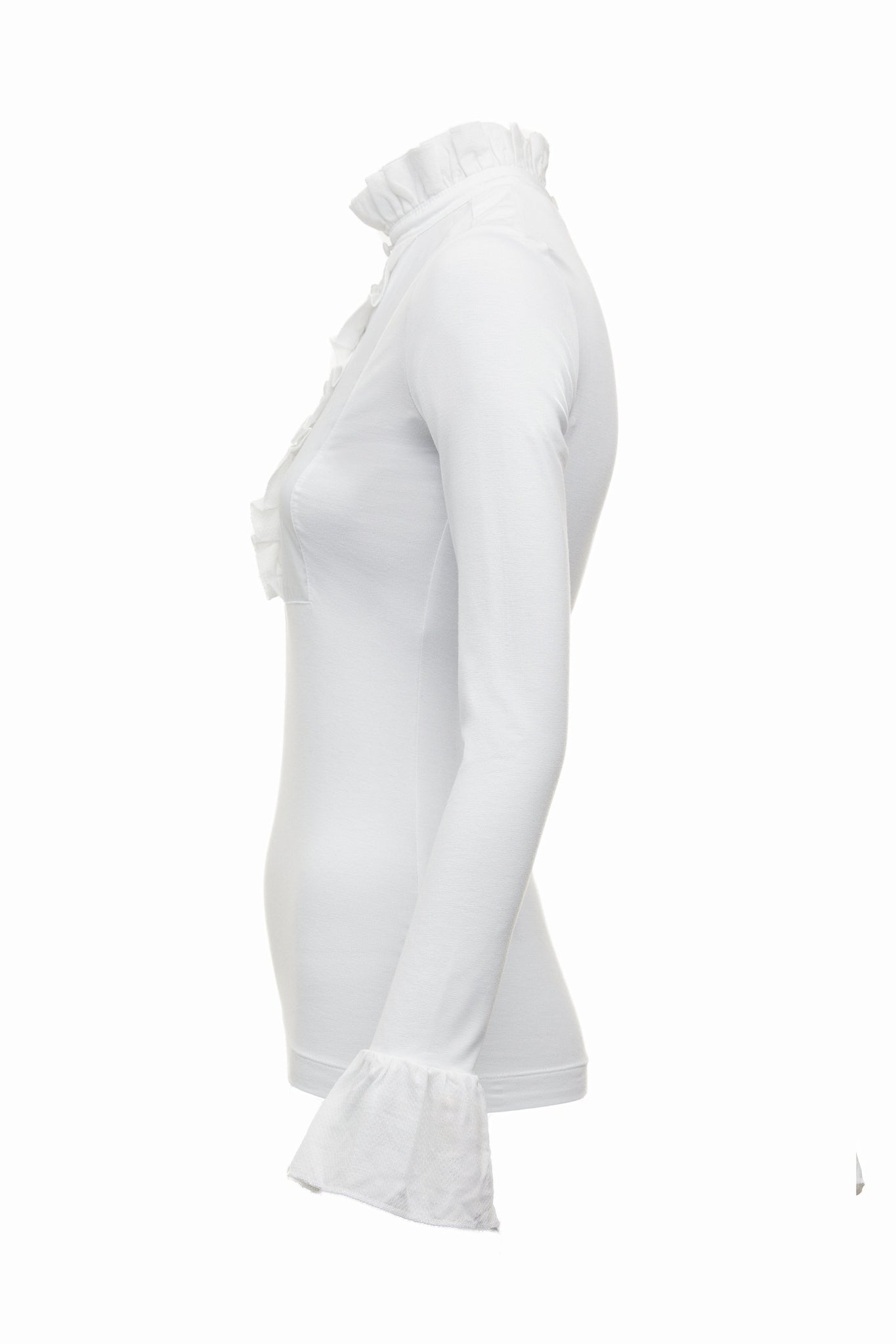 side image of a neatly fitted white long sleeve top with ruffled neckline and cuffs with frilly chest detail