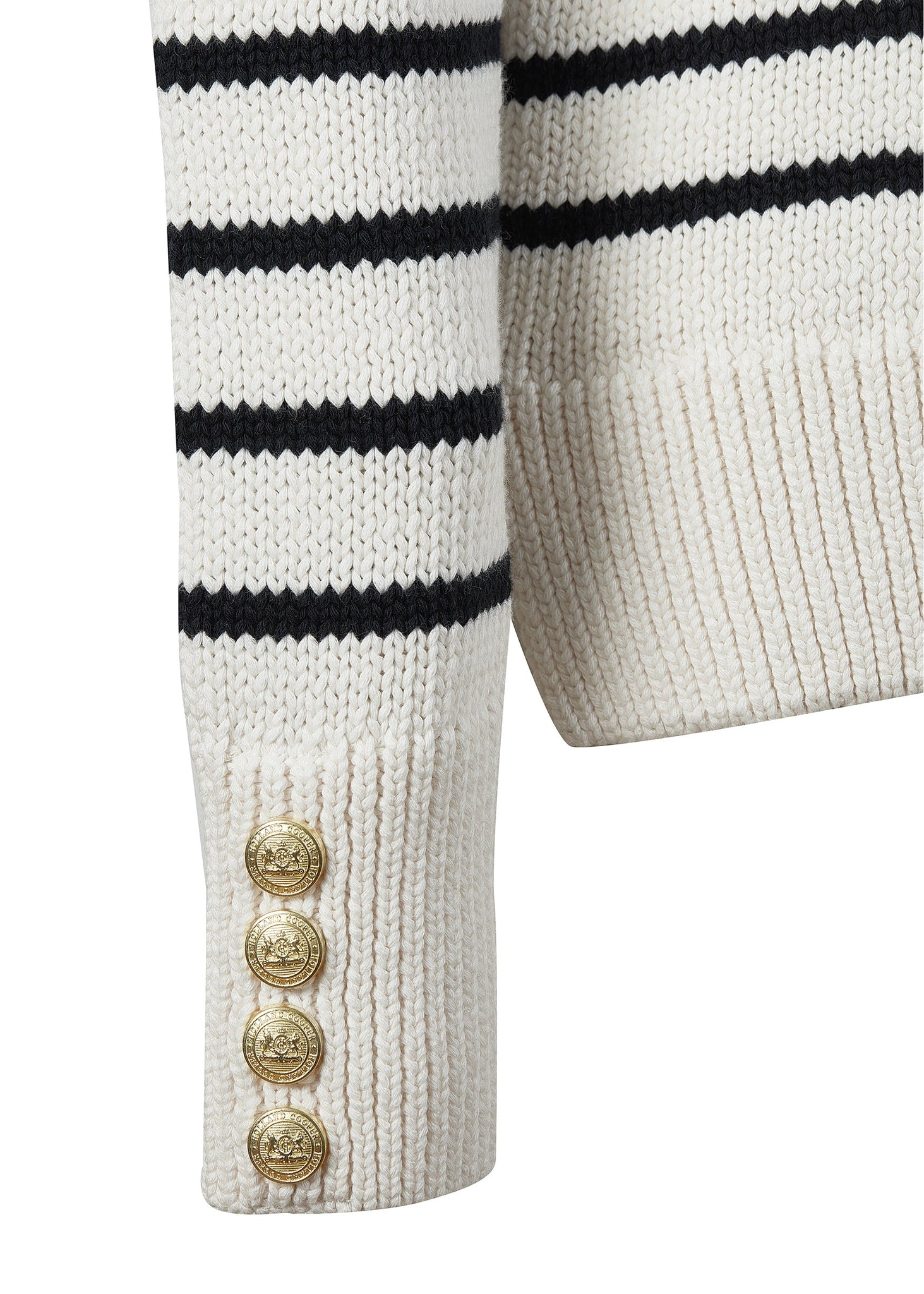 gold button cuff detail on a classic cream and navy breton stripe crew neck jumper with a split ribbed hem and gold button detail on the cuffs and collar