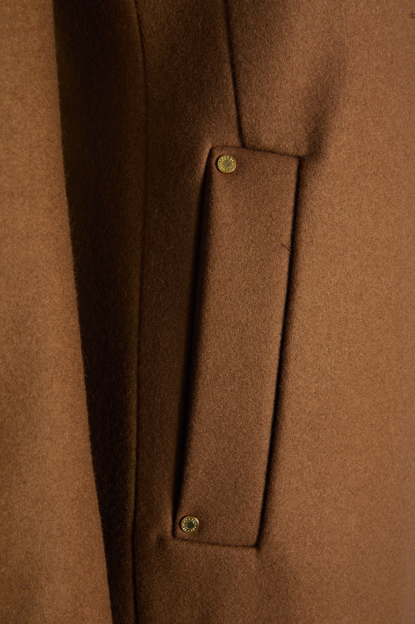 pocket detail on womens dark camel single breasted full length wool coat