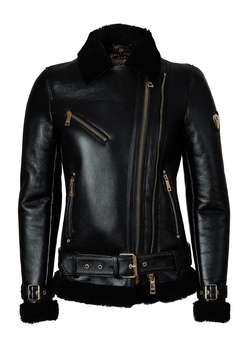 classic aviator jacket in black leather with back shearling inside that accents the cuffs hem and collar with belt detail on the hem and cuffs three pockets and angular zip fastening